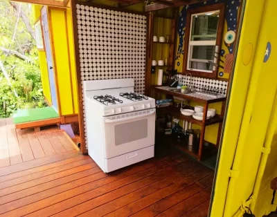Front entry of the tiny eco-friendly vacation rental at Da Fire Farm in Volcano, Hawaii