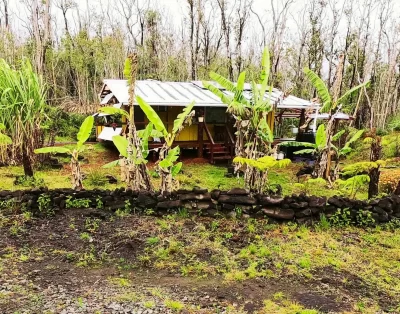 Front view of the tiny eco-friendly vacation rental at Da Fire Farm in Volcano, Hawaii