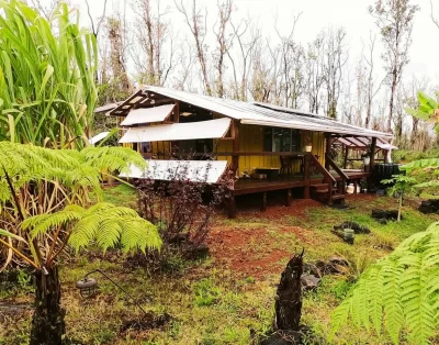 Side view of the tiny eco-friendly vacation rental at Da Fire Farm in Volcano, Hawaii