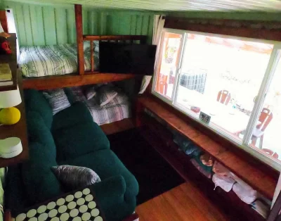Interior view of the tiny eco-friendly vacation rental at Da Fire Farm in Volcano, Hawaii