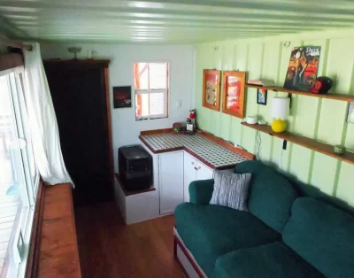 Interior view of the tiny eco-friendly vacation rental at Da Fire Farm in Volcano, Hawaii