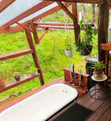 picture of bath tub area outside of the tiny eco-friendly vacation rental at Da Fire Farm in Volcano, Hawaii