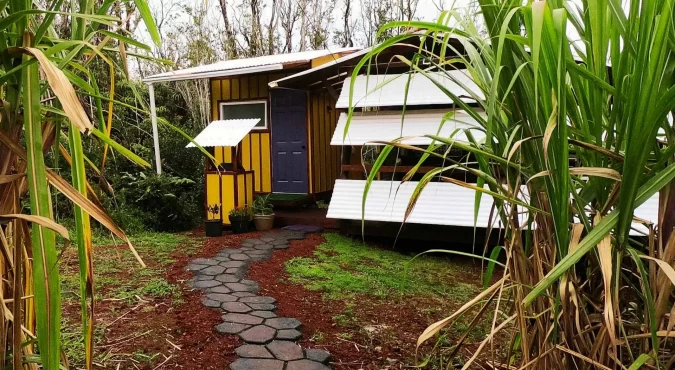 Walking path leading to the eco-friendly vacation rental at Da Fire Farm in Volcano, Hawaii